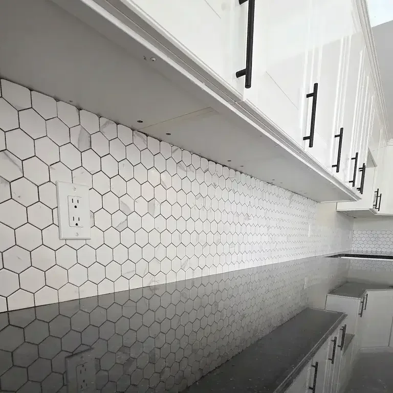 Backsplash installation — Rough Carpentry Contractors; Finish Carpentry Services Ontario; O.Reg. 332/12 compliant portfolio